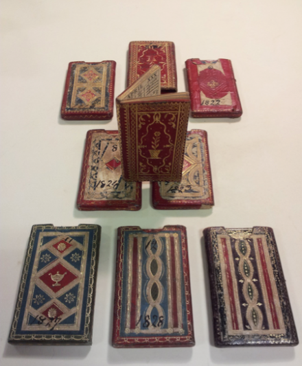 Miniature London Almanacks in their original bindings.  Image courtesy of the Guildhall Library.